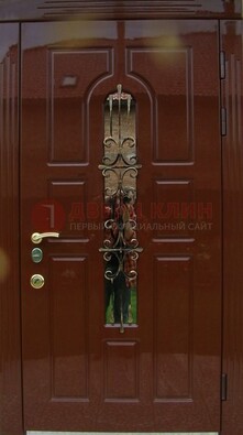 Красивая металлическая дверь со стеклом и ковкой ДСК-33 в Электростали