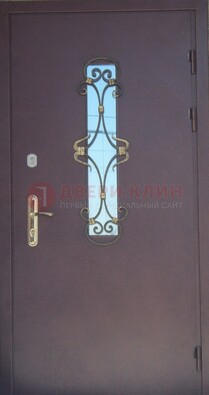 Металлическая дверь со стеклом и ковкой ДСК-77 в панельный дом в Краснодаре